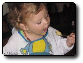 Eating with a spoon 14 months